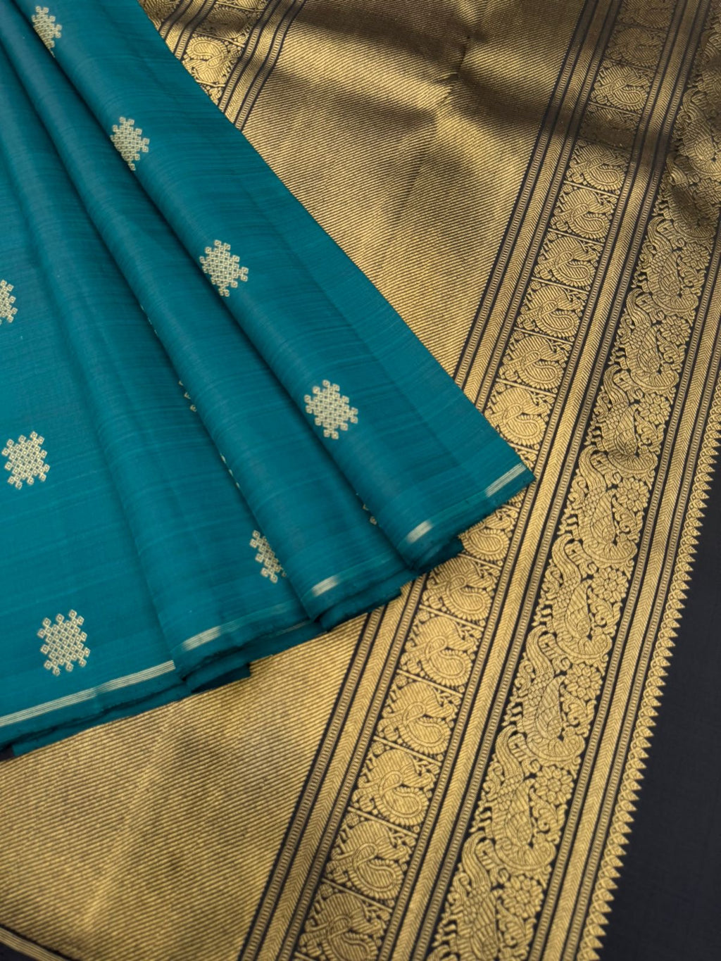 Mohaa - Rarest Borderless Kanchivarams - dark deep burnt blue/green ( a rare tone ) with grand black pallu and blouse
