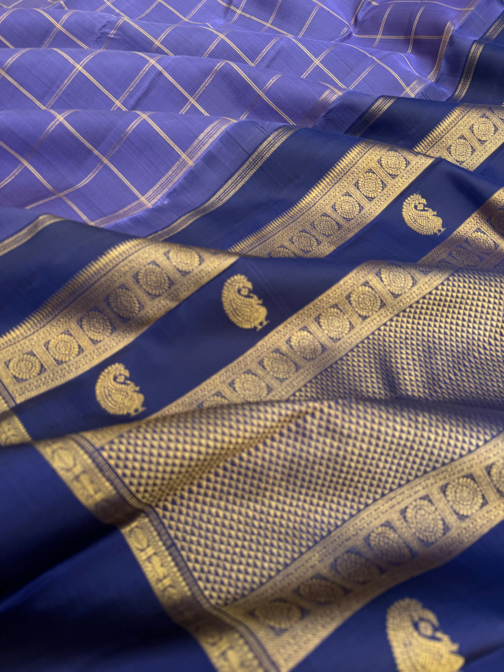 Molten Play on Kanchivaram - a most gorgeous metallic deep lavender and navy blue with kattam woven body and unique pallu