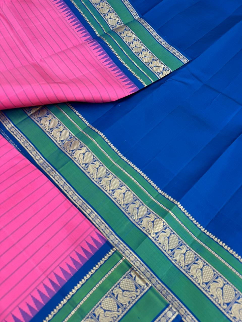 The Best of No Zari Korvai Kanchivaram - candy pink and ink blue with annapakshi woven borders with strips woven body