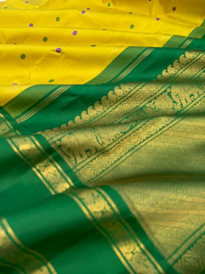 Vintage Ragas on Kanchivaram - a much loved sampanga yellow korvai Kanchivaram with retta pett ganga jammuna korvai borders with silk buttas woven body