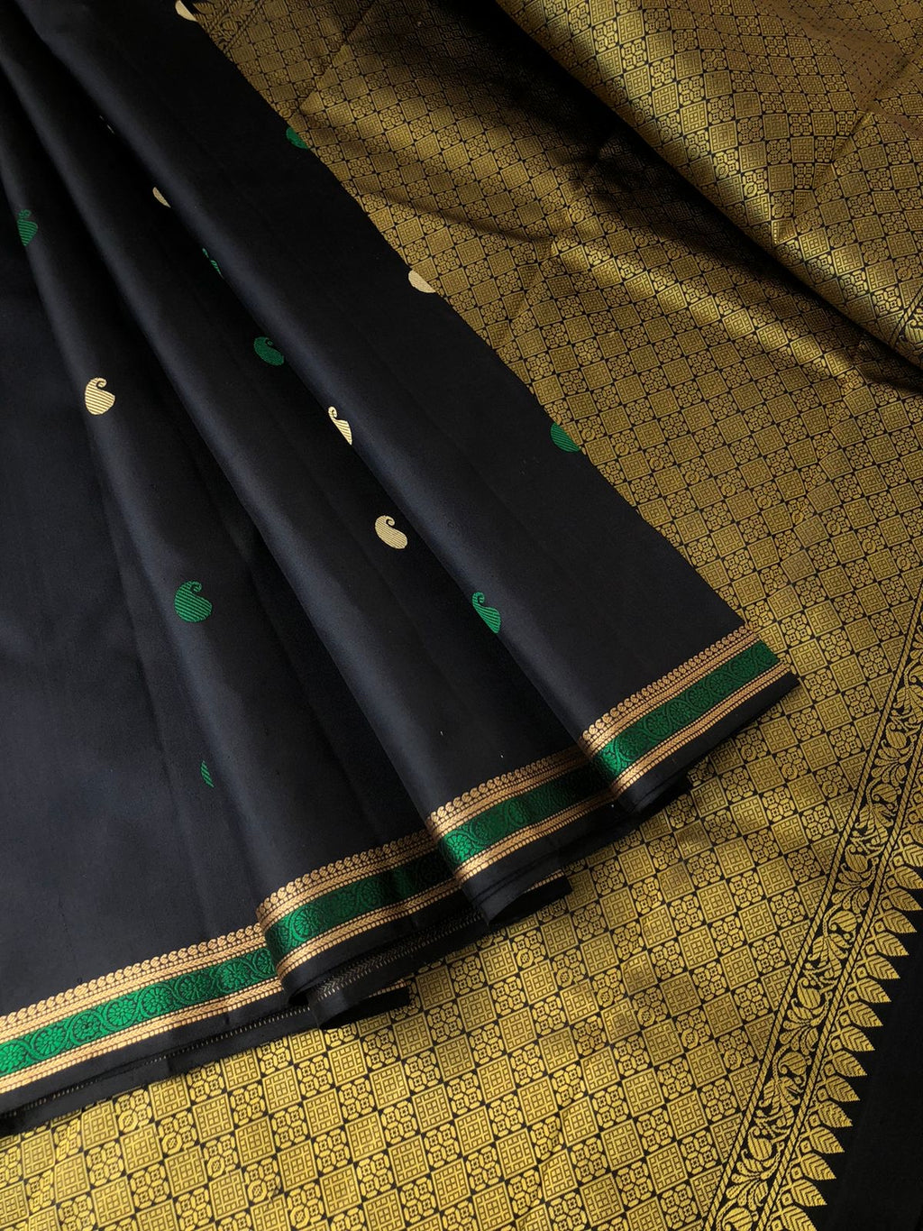 Woven from Memories - Stunning No Zari Kanchivarams - the black at the best with small woven borders with paisley woven buttas