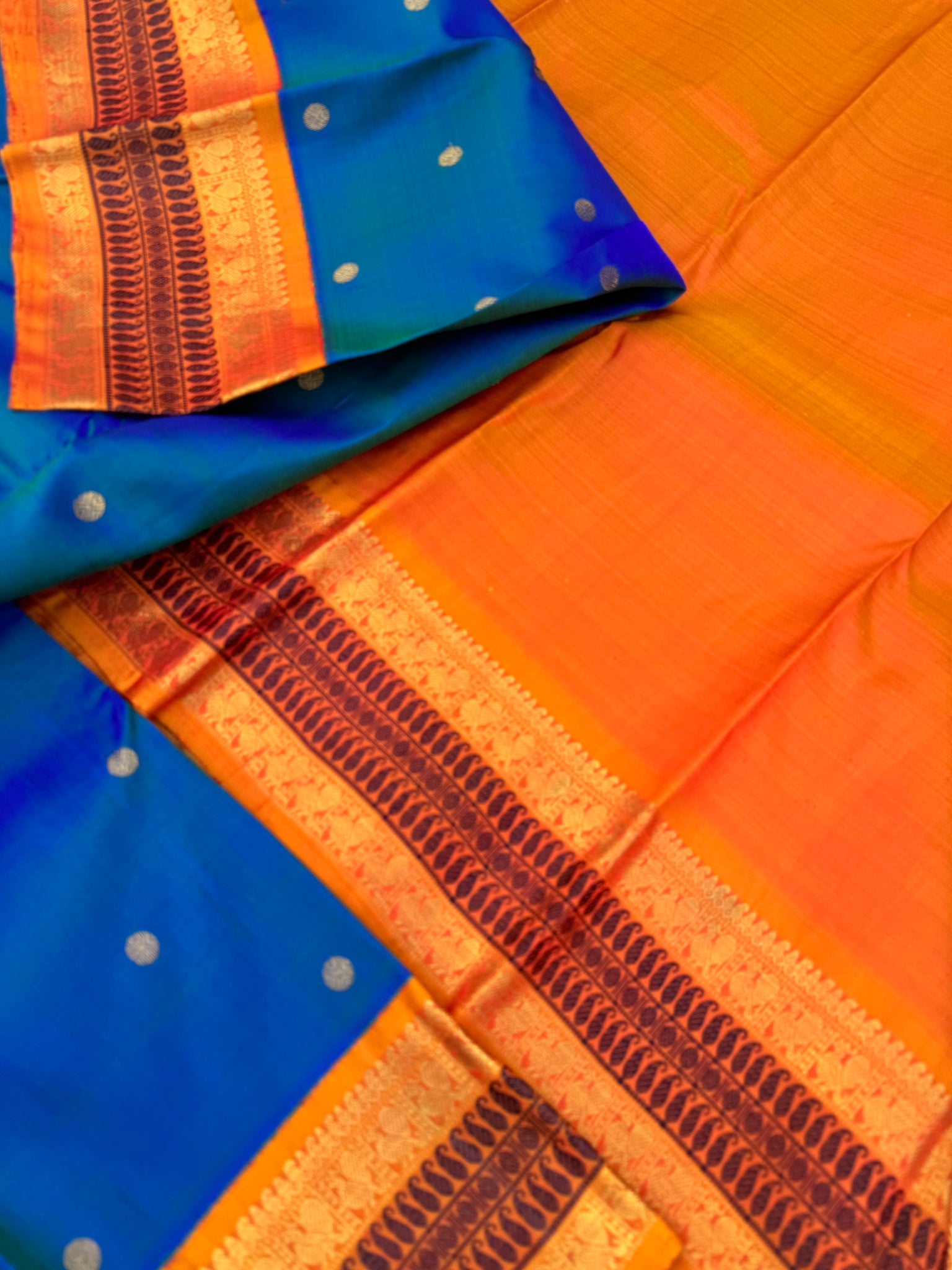 Aarambam - Where Tradition Begins - a classy peacock blue green body with vintage mustard zari and silk thread woven borders and pallu