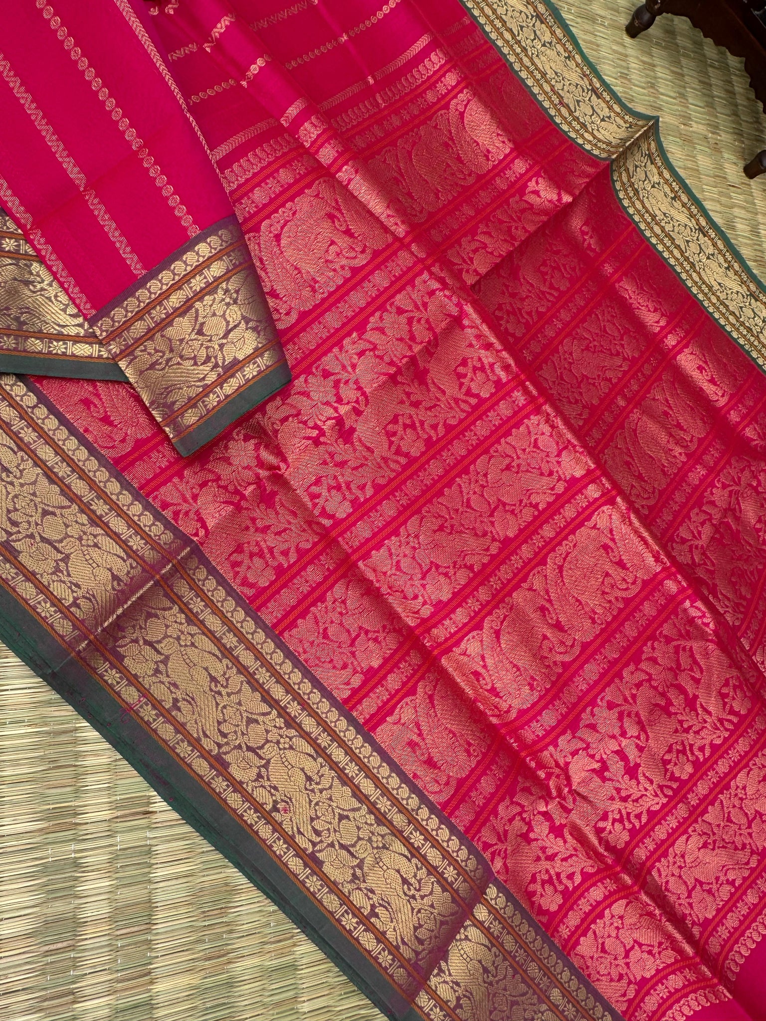 Zari Kissed Silk Cotton - reddish pink vertical veldhari with parrots woven borders