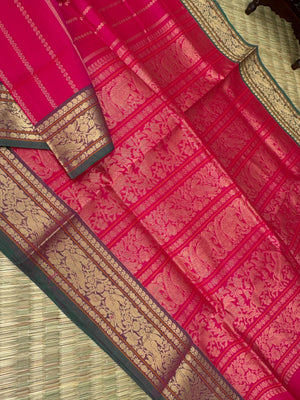 Zari Kissed Silk Cotton - reddish pink vertical veldhari with parrots woven borders
