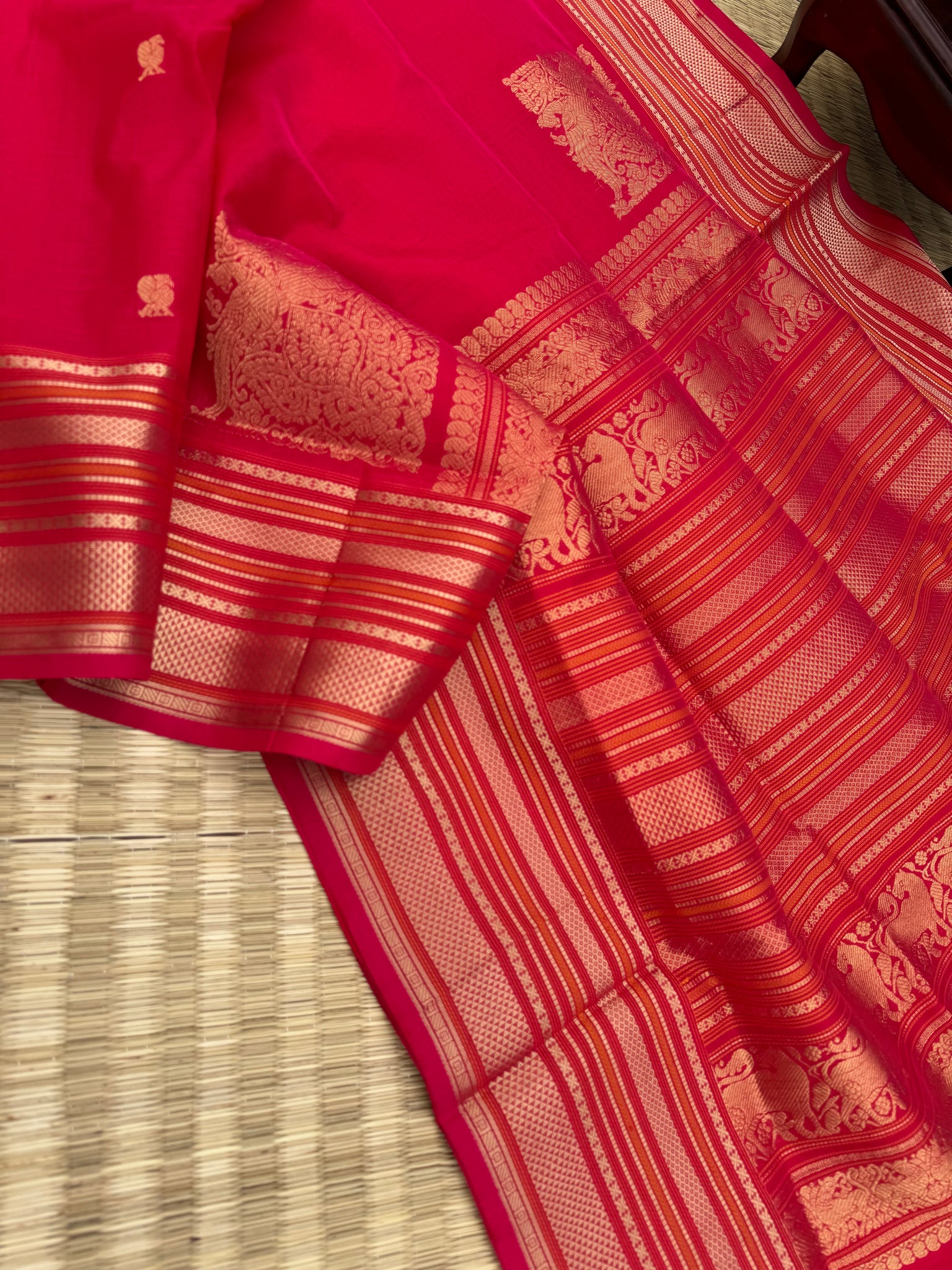 Zari Kissed Silk Cotton - tomato red grand borders and pallu with corner buttas