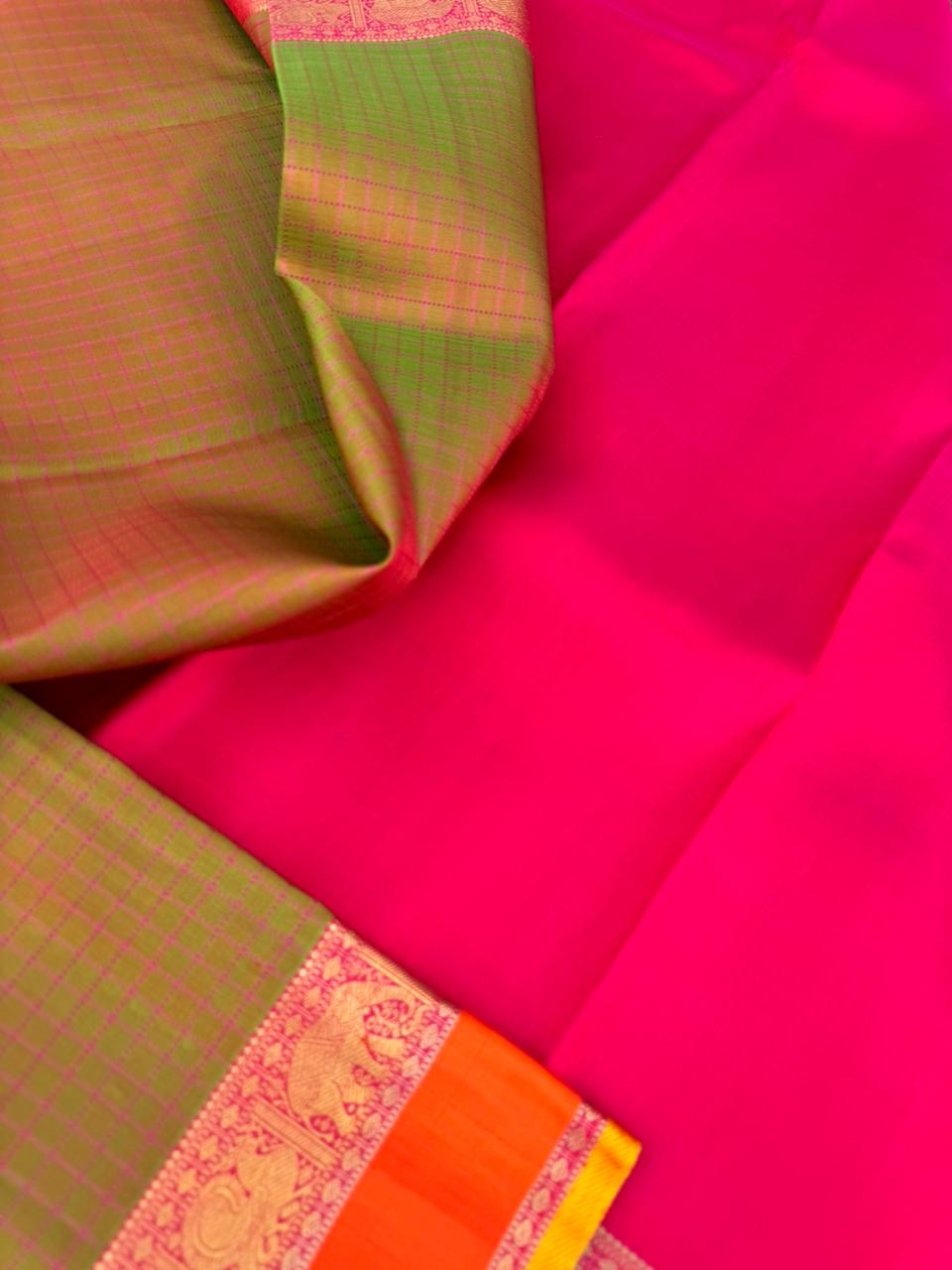 Kanchivaram Trunk - a perfect dual tone maanthulir muthu kattam with orange borders and rani pink pallu!! Highlight is the mustard sleeve edge