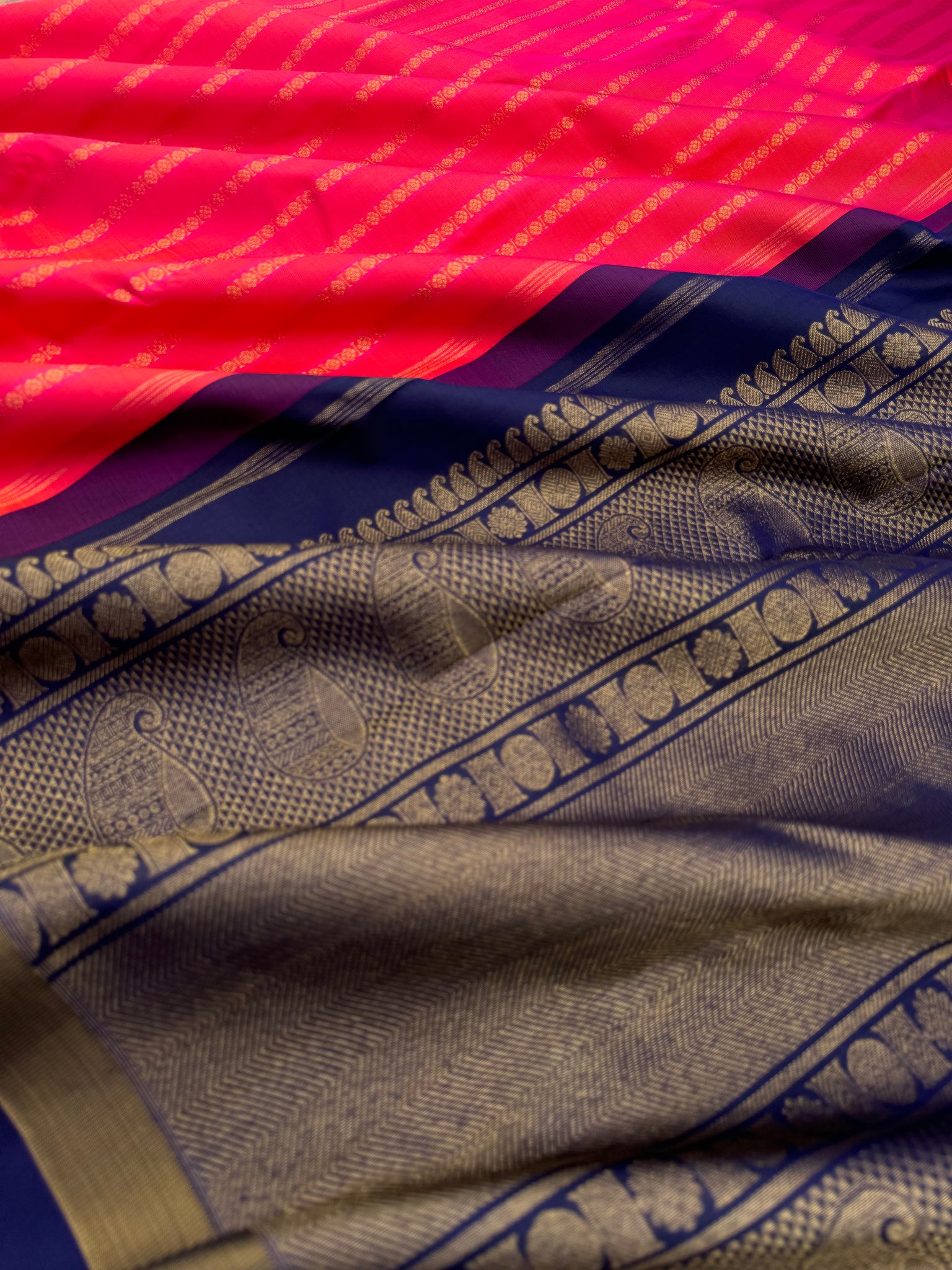 Album Untouched - a stunning orange mixed pink dual tone rudurakasham woven vertical veldhari with deep navy blue pallu and blouse