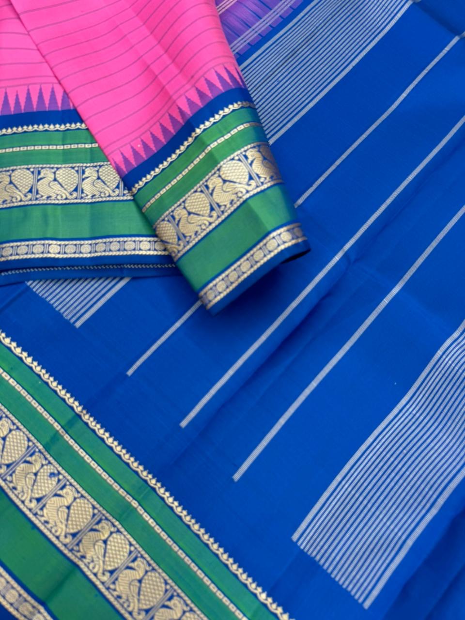 The Best of No Zari Korvai Kanchivaram - candy pink and ink blue with annapakshi woven borders with strips woven body