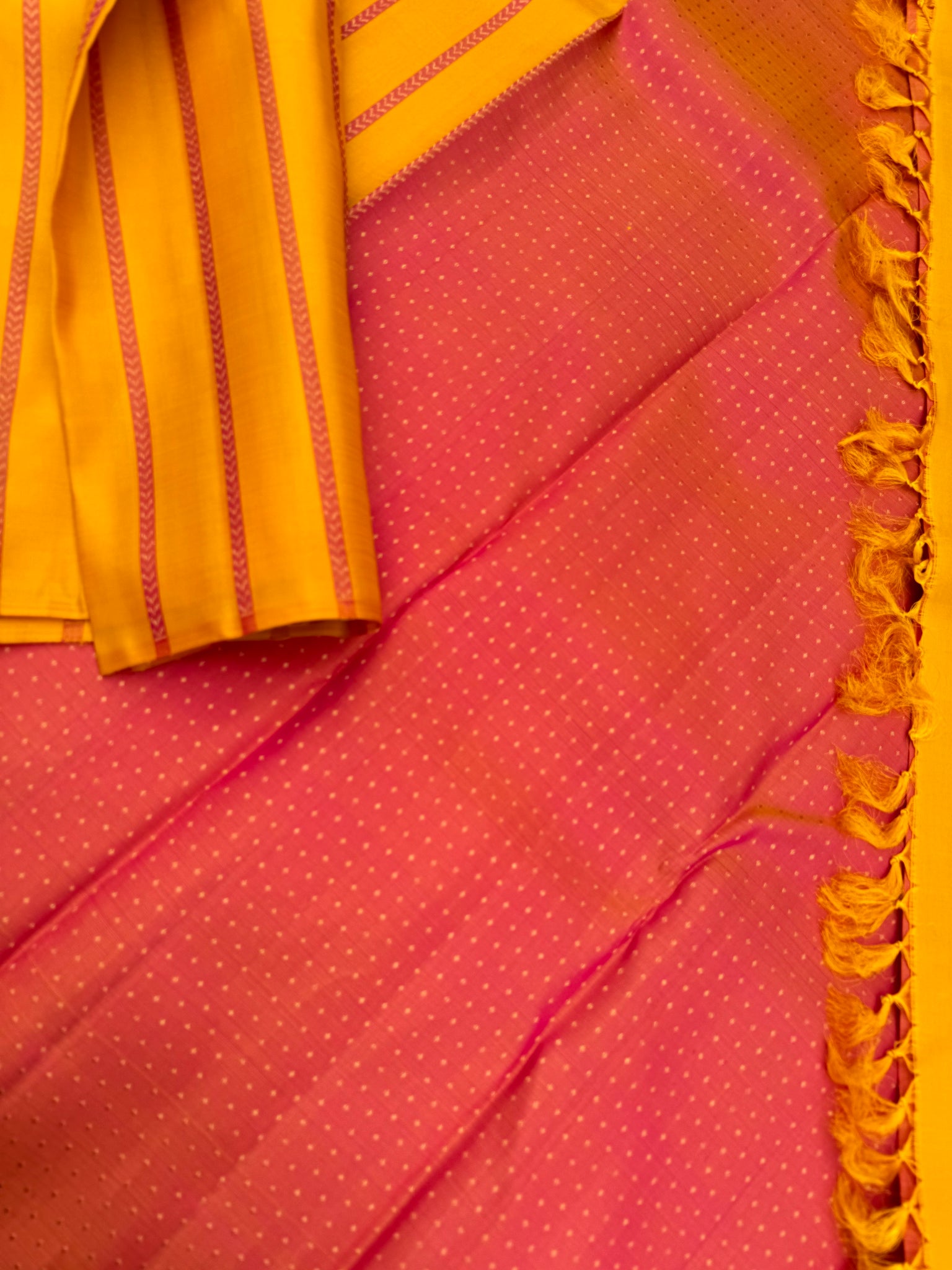 Album Untouched - a stunning yellow vertical veldhari woven body with dual tone peach grand zari woven pallu and blouse