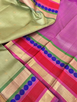 Statement of Kanchivaram - Something Different - most beautiful pastel pista green with zari and thread woven varusai pett borders