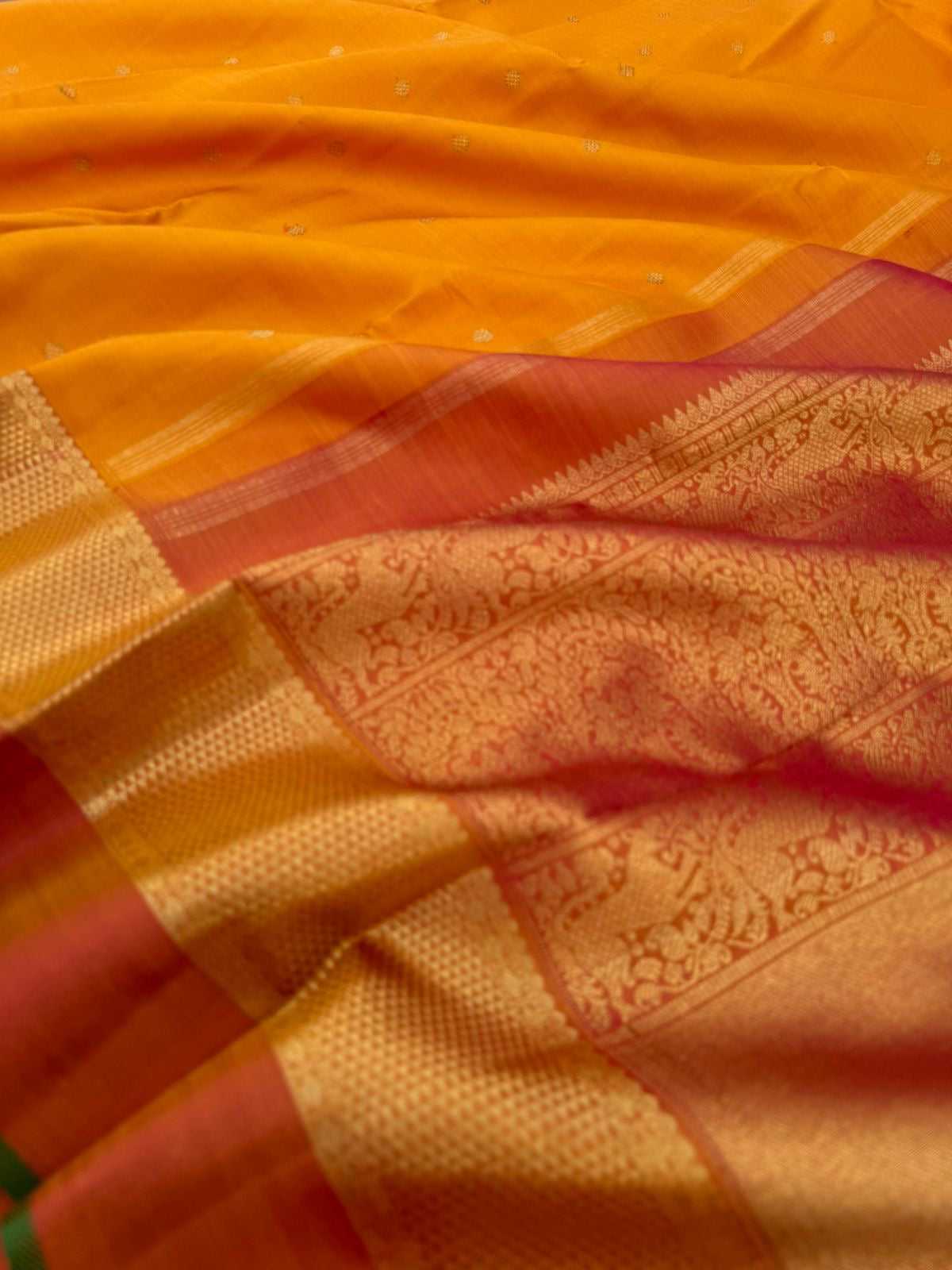 Colour Play on Kanchivaram - traditional at the best mustard and rust with aarai maadam woven borders with gorgeous grand pallu