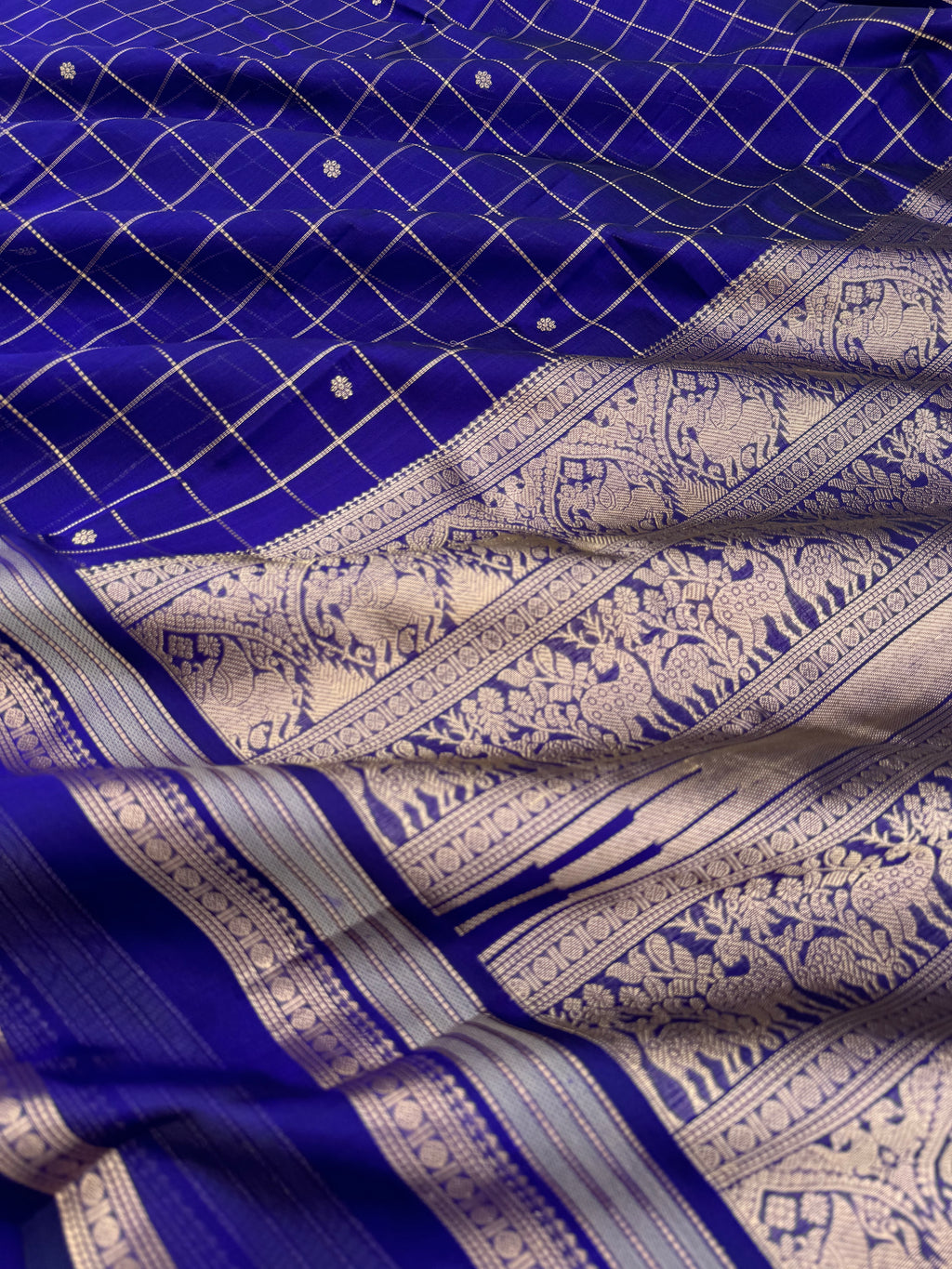 Zari Kissed Silk Cotton - a deep dark ink blue muthukattam with traditional moopula woven borders