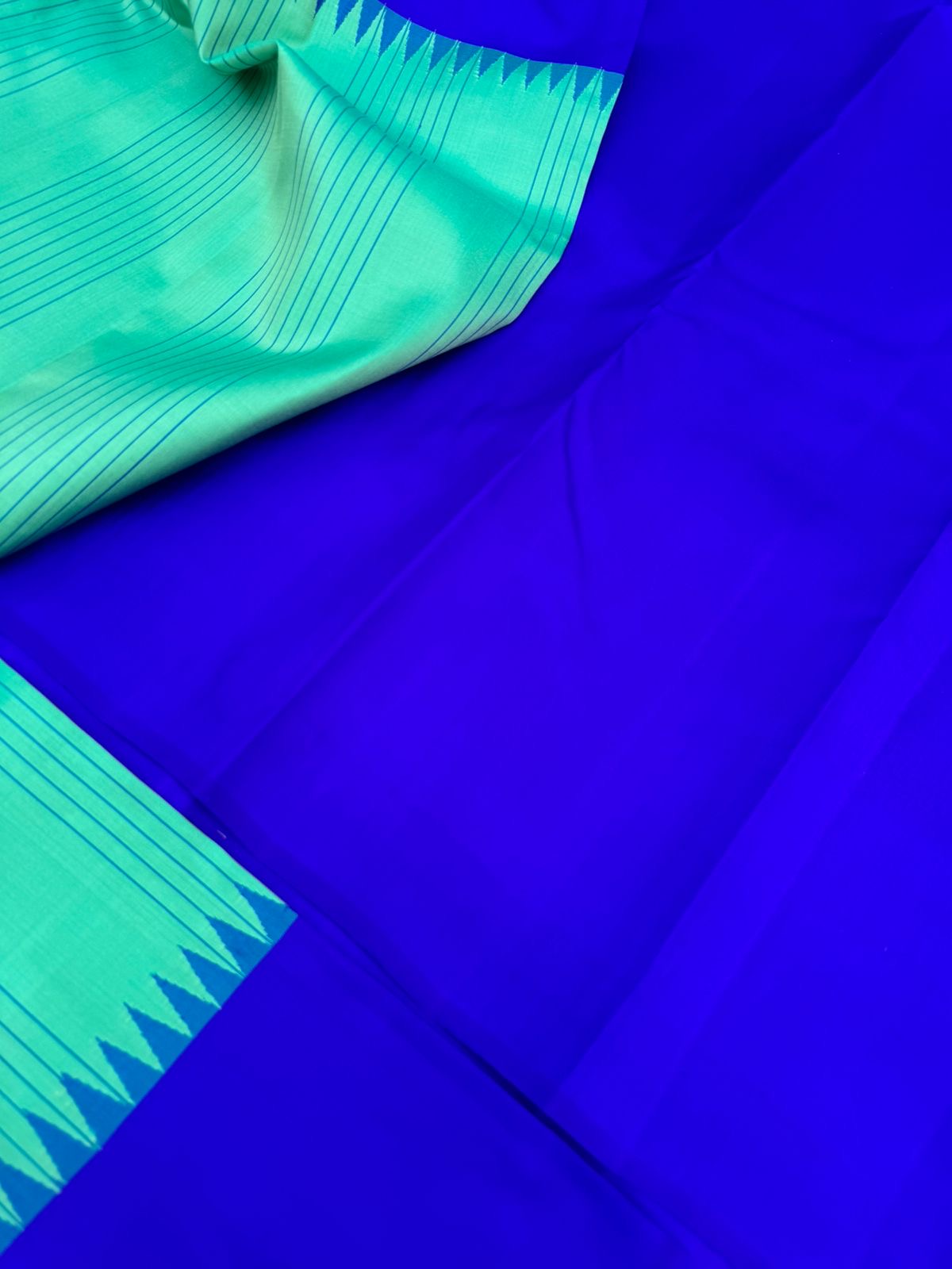 The Best of No Zari Korvai Kanchivaram - a stunning aqua and ms blue with vertical stripes woven body