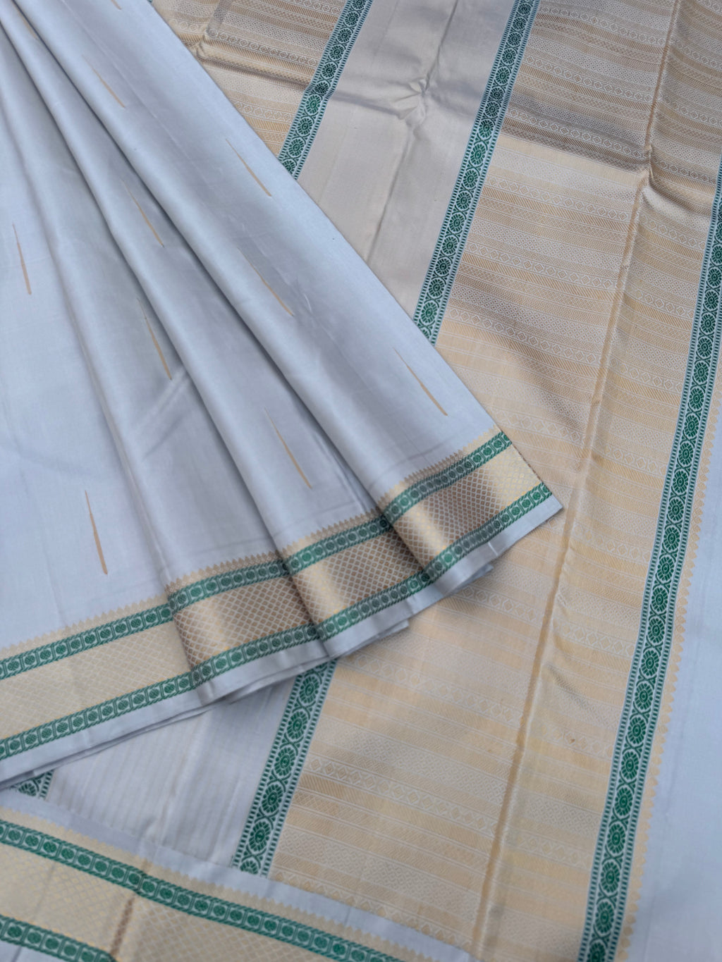 Woven from Memories - Stunning No Zari Kanchivarams - a beautiful pastel silver grey rain drops woven buttas for people who love small borders