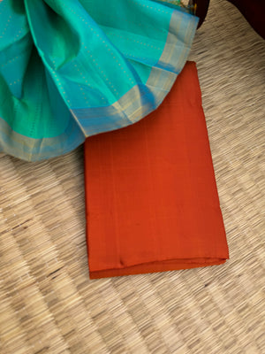 Niram - Celebrating of Colours of Full Plain Kanchivaram Silks Paired with Beautiful Contrasting Blouses - rust orange saree with kanchivaram silk dual tone aqua blouse