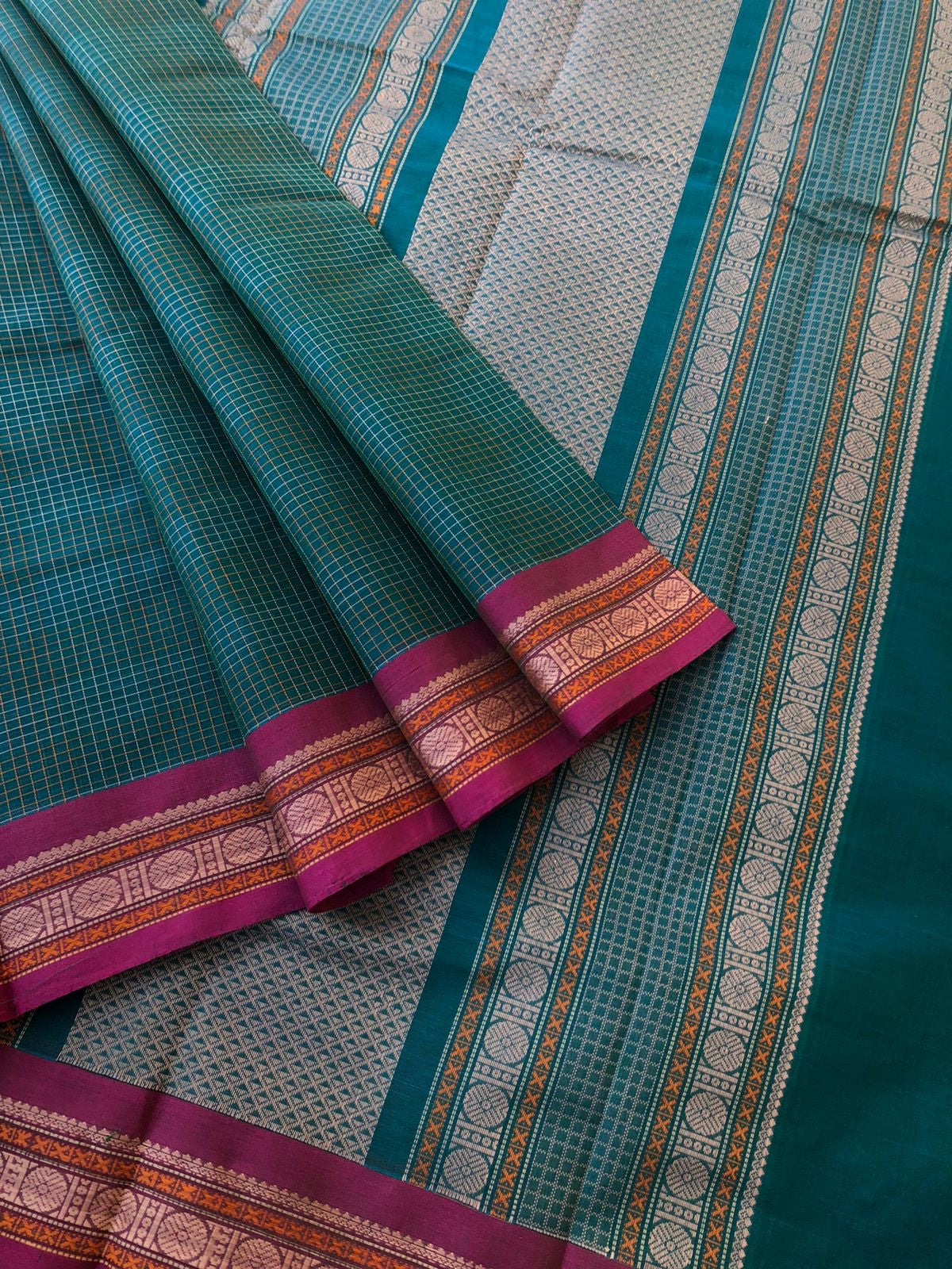 Mangalavastaram - teal blue interlocking woven chec with small woven borders