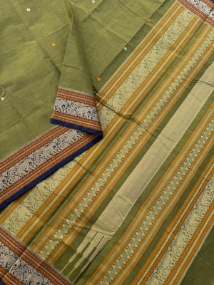 Mangalavastaram - a stunning deep algae green with elephant woven borders