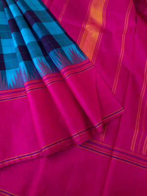 Connected by Korvai on Kanchivaram - blue and blue kattam with Indian pink borders