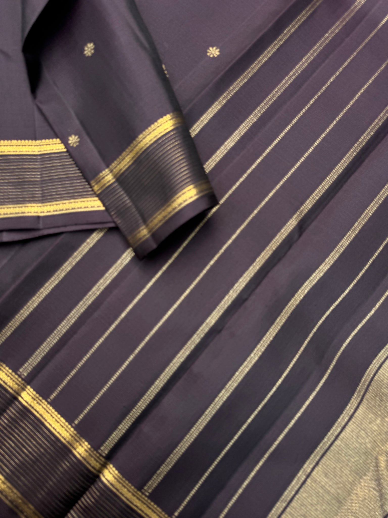 Aadthyayam – The Everyday Kanchivaram - a dark deep betel nut brown with vairaoosi boder with stunning buttas woven body