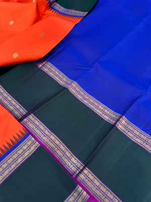 The Korvai Vibes - Authentic Korvai Kanchivaram - gorgeous orange body and forest green borders with royal blue intricate pallu and blouse