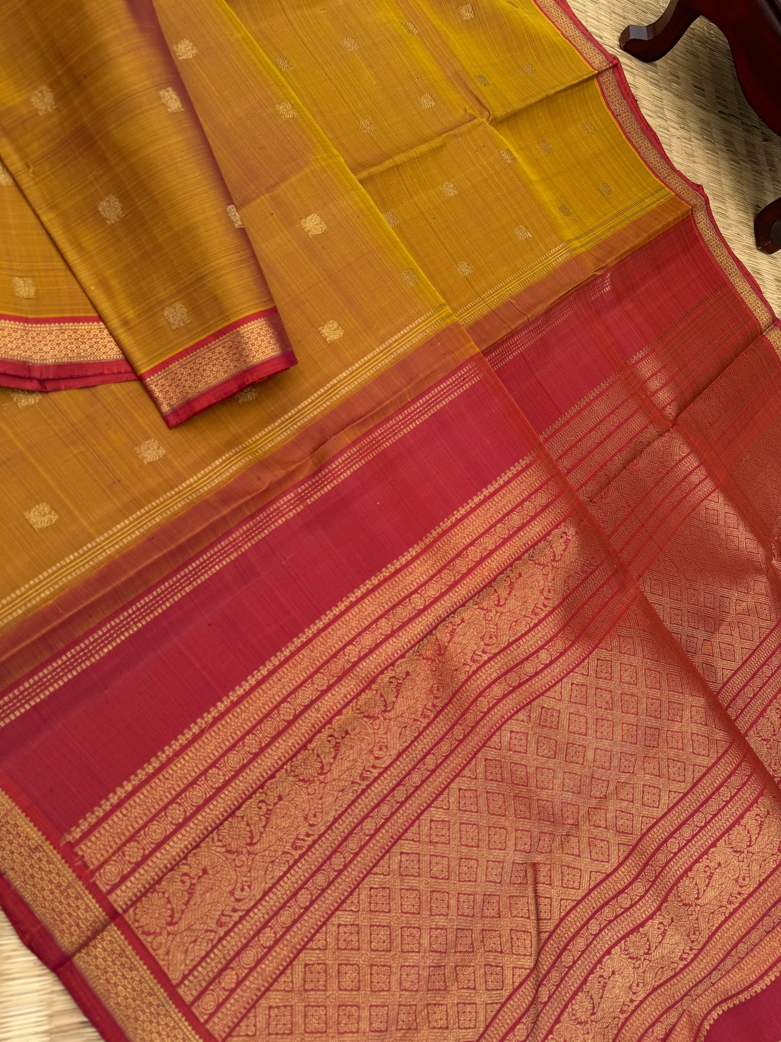 Leela - The bliss of small border Kanchivarams - rust honey and mustard dual tone body with red pallu and buttas woven pallu