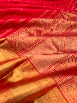 Kamakshi -the gorgeous red and gold with solid gold zari woven borders and pallu