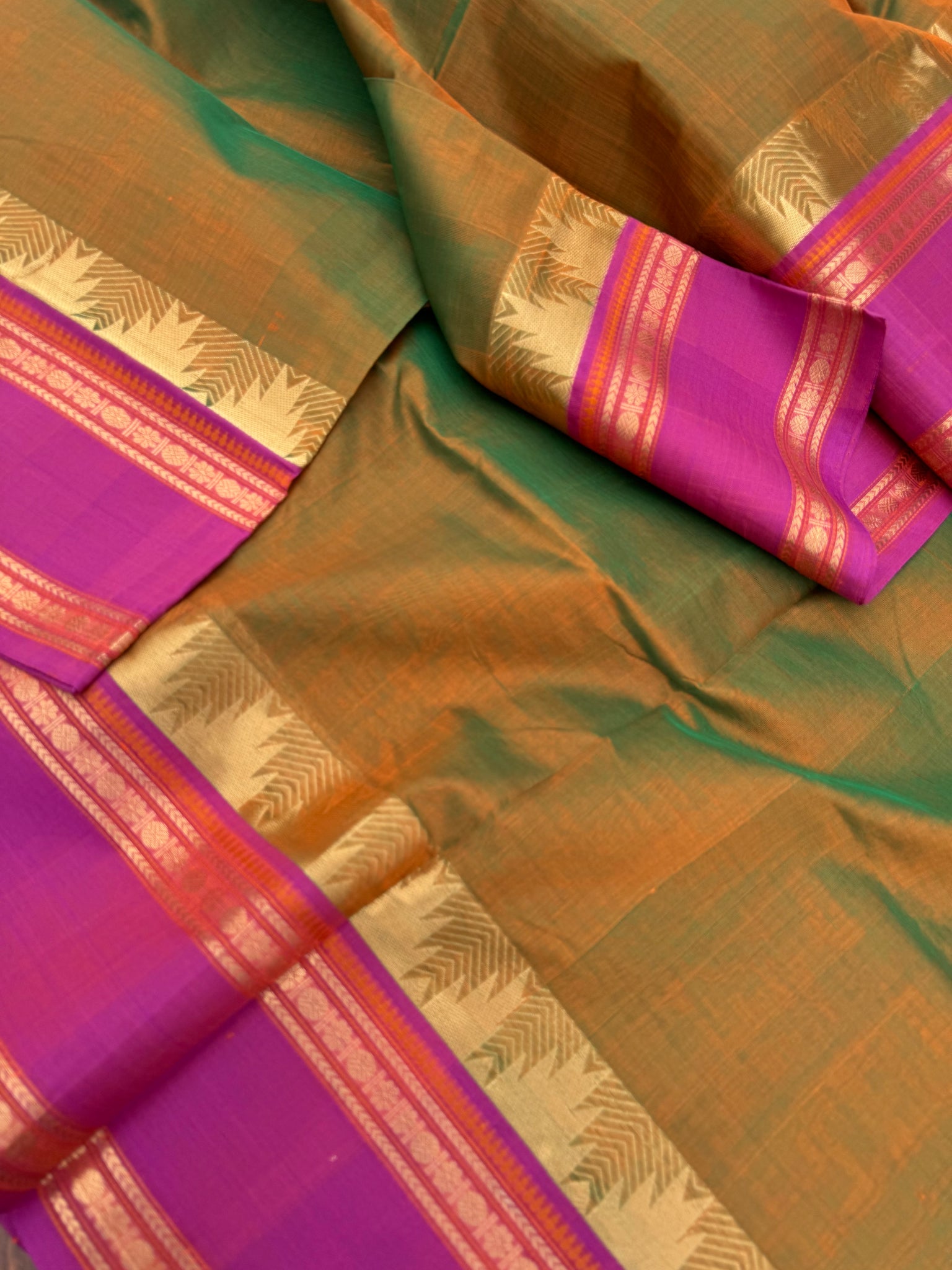 Zari Kissed Silk Cotton - a deep dark honey mustard mixed green with majentha borders