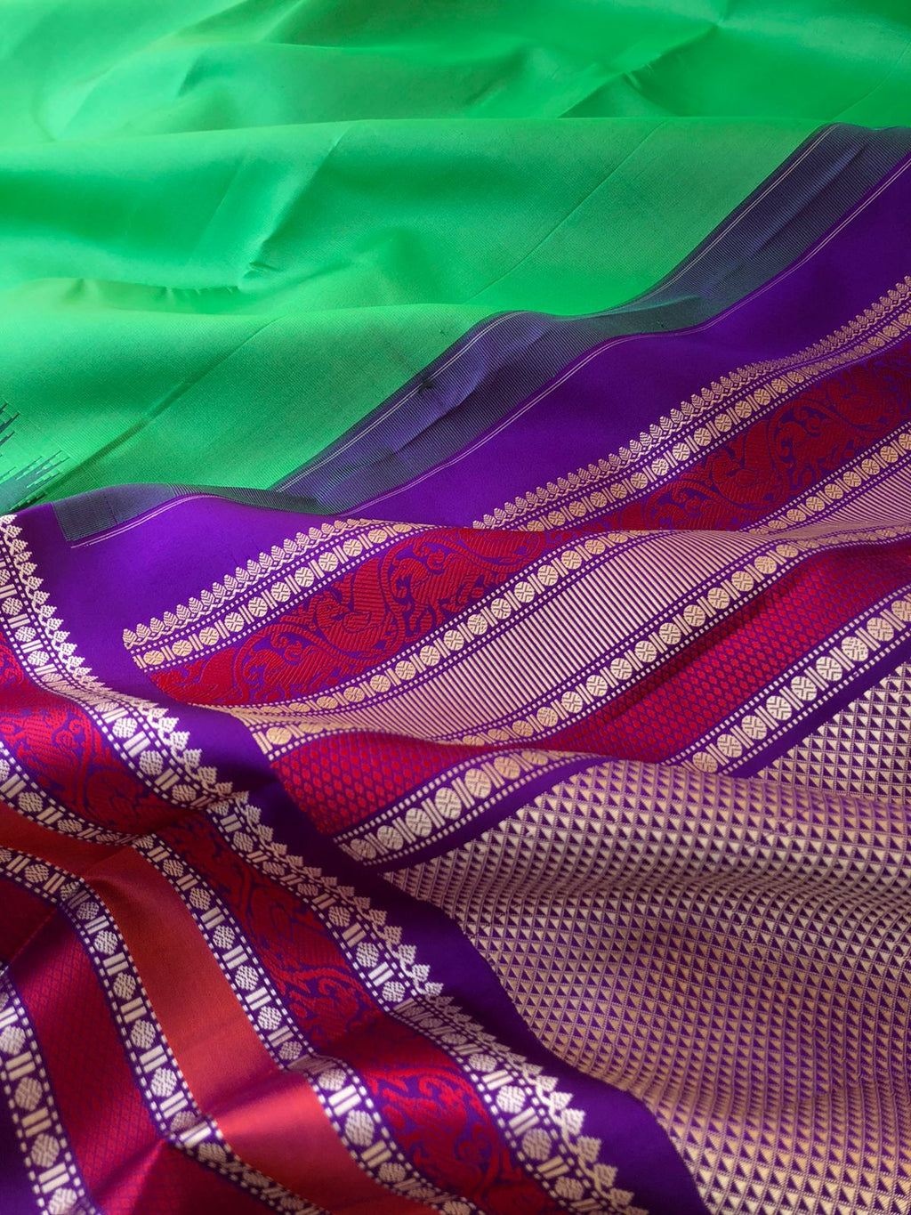 Silk Play on No Zari Kanchivaram - gorgeous green and deep purple