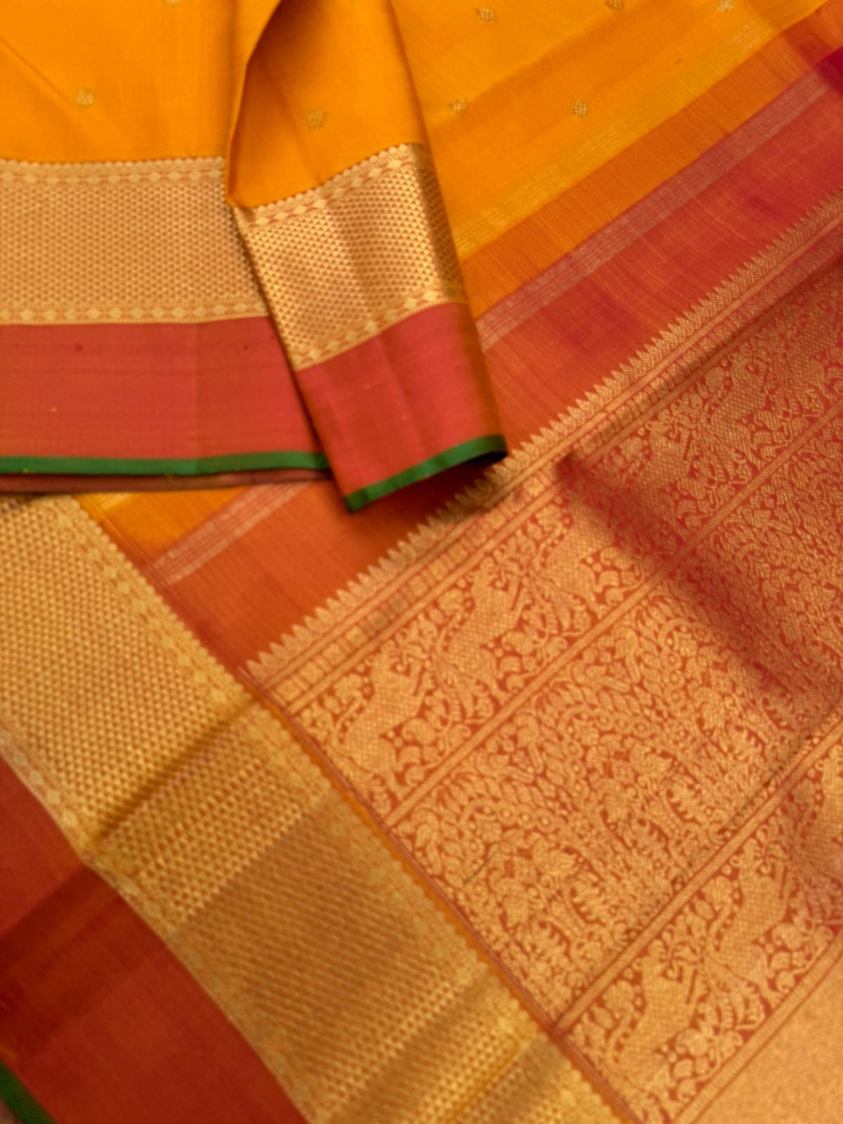Colour Play on Kanchivaram - traditional at the best mustard and rust with aarai maadam woven borders with gorgeous grand pallu