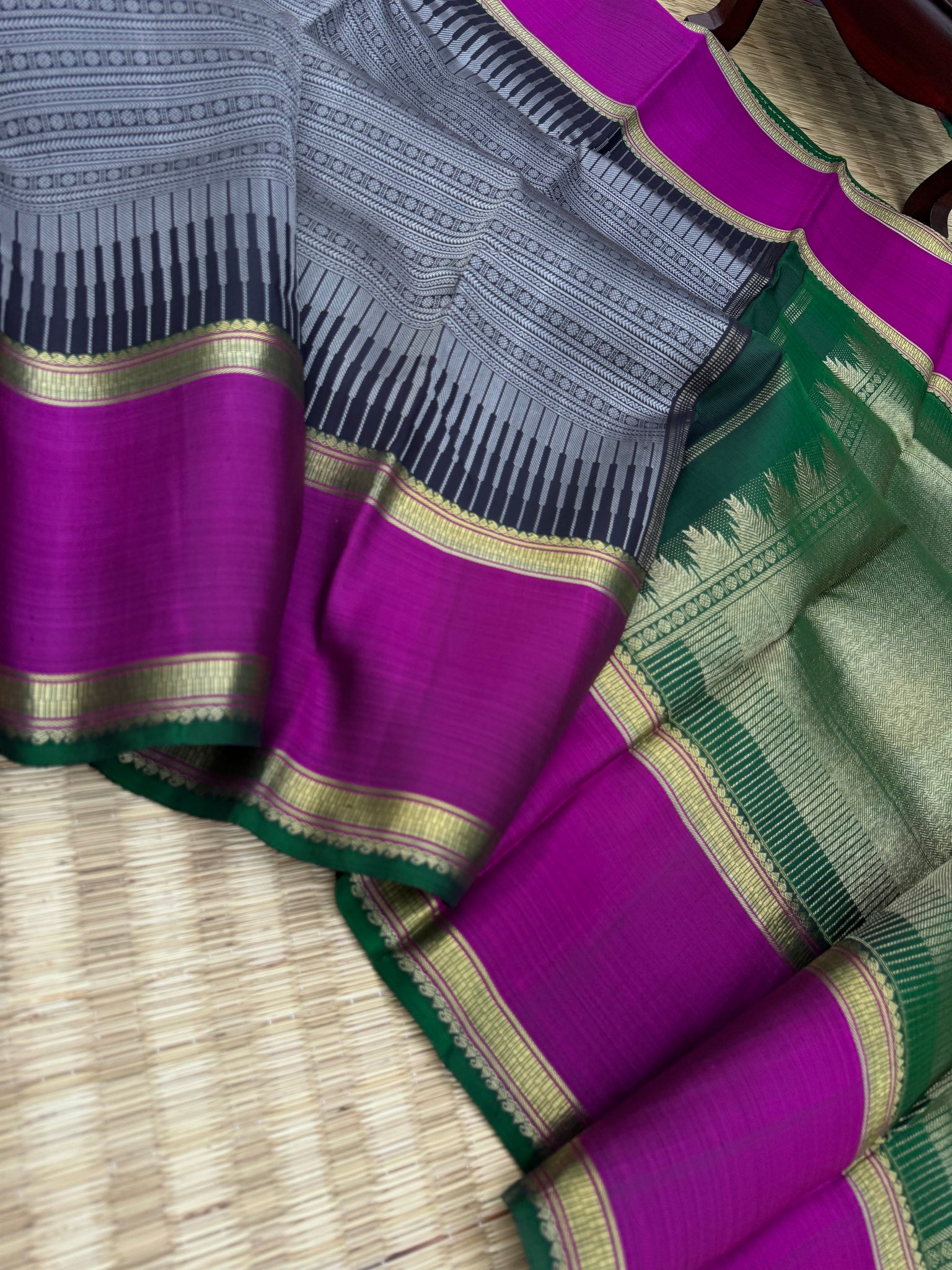 Haritham - Heirloom Yarn Play on Kanchivaram - a grey black full body varusai pett with green pallu and blouse with majentha borders
