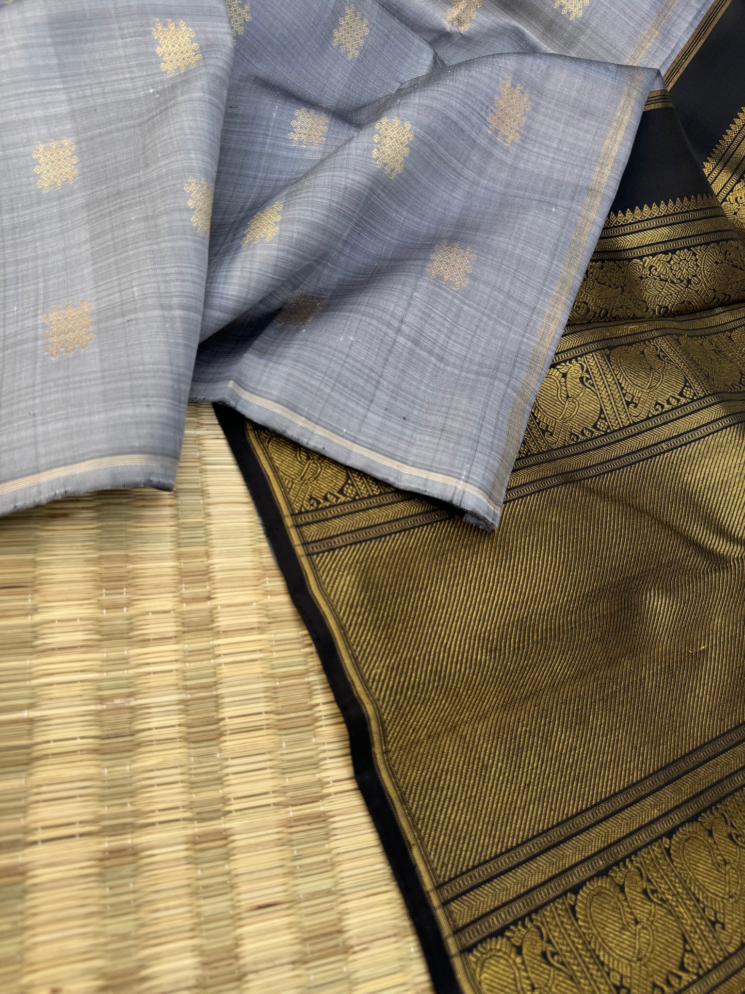 Mohaa - Beautiful Borderless Kanchivarams - stunning metallic grey and black with kolam buttas with grand woven pallu