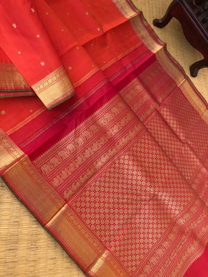 Tara - Traditional Colours on Traditional Kanchivarams - gorgeous burnt orange and red with solid gold zari woven borders and pallu