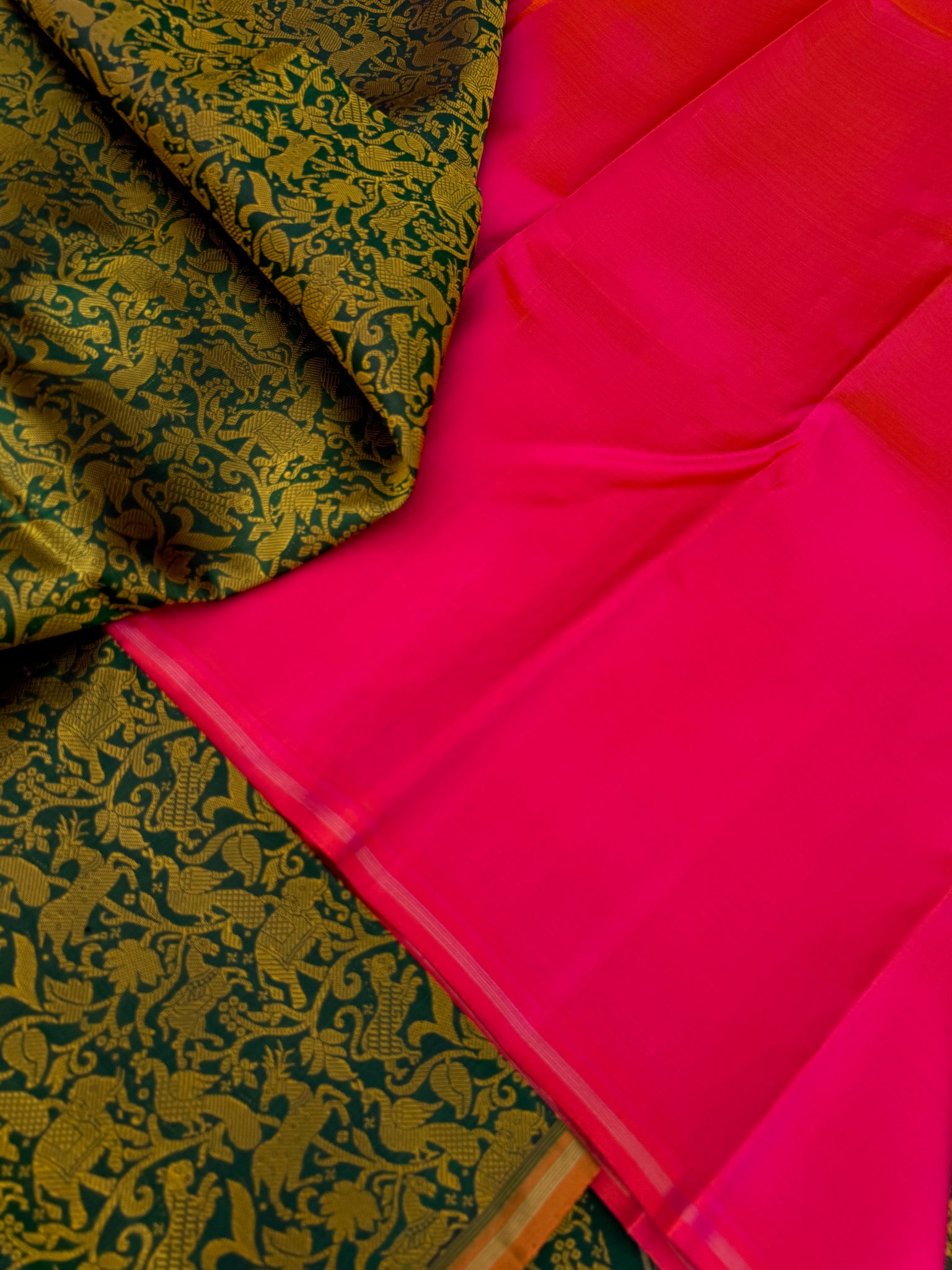 Haritham - Heirloom Yarn Play on Kanchivaram - a stunning deep green base and mustard silk weave vanasingaram with orangish pink dual tone pallu ans blouse