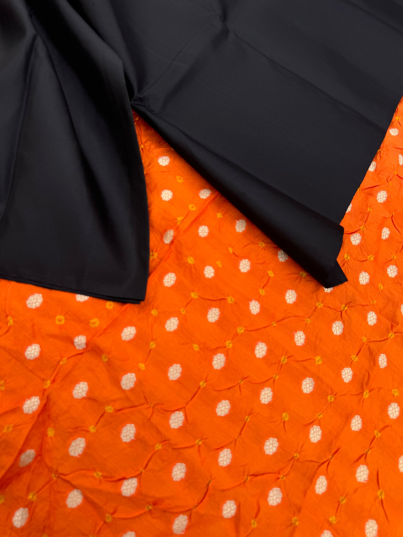 Niram - Celebrating of Full Plain Kanchivaram Silks Paired with Beautiful Blouses - black saree with orange silk bandhani blouse