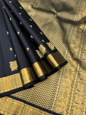 Vintage Ragas on Kanchivaram - a rarest gem of this collection, a full black and gold with old charm bettu buttas woven borders