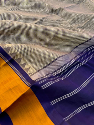 Signature Silk Cotton -English kasa kasa kattam with deep navy blue pallu and blouse