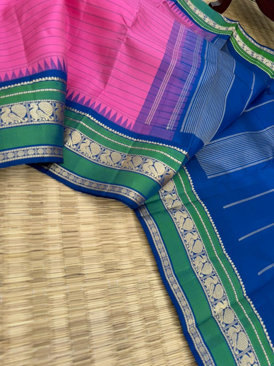 The Best of No Zari Korvai Kanchivaram - candy pink and ink blue with annapakshi woven borders with strips woven body