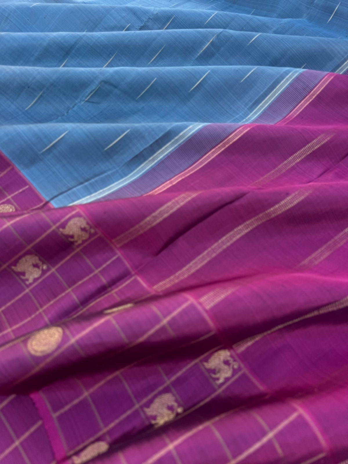 Shree - Simple and Elegant Kanchivarams - a bluish grey tone kanchivaram with raindrops woven buttas with yali and rudurakasham buttas woven chex borders