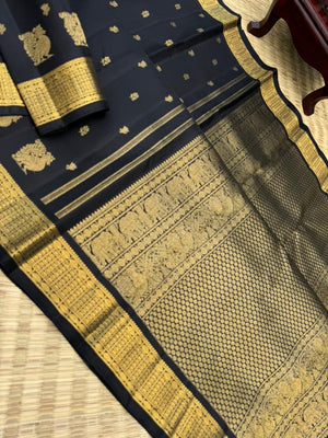 Vintage Ragas on Kanchivaram - a rarest gem of this collection, a full black and gold with old charm bettu buttas woven borders