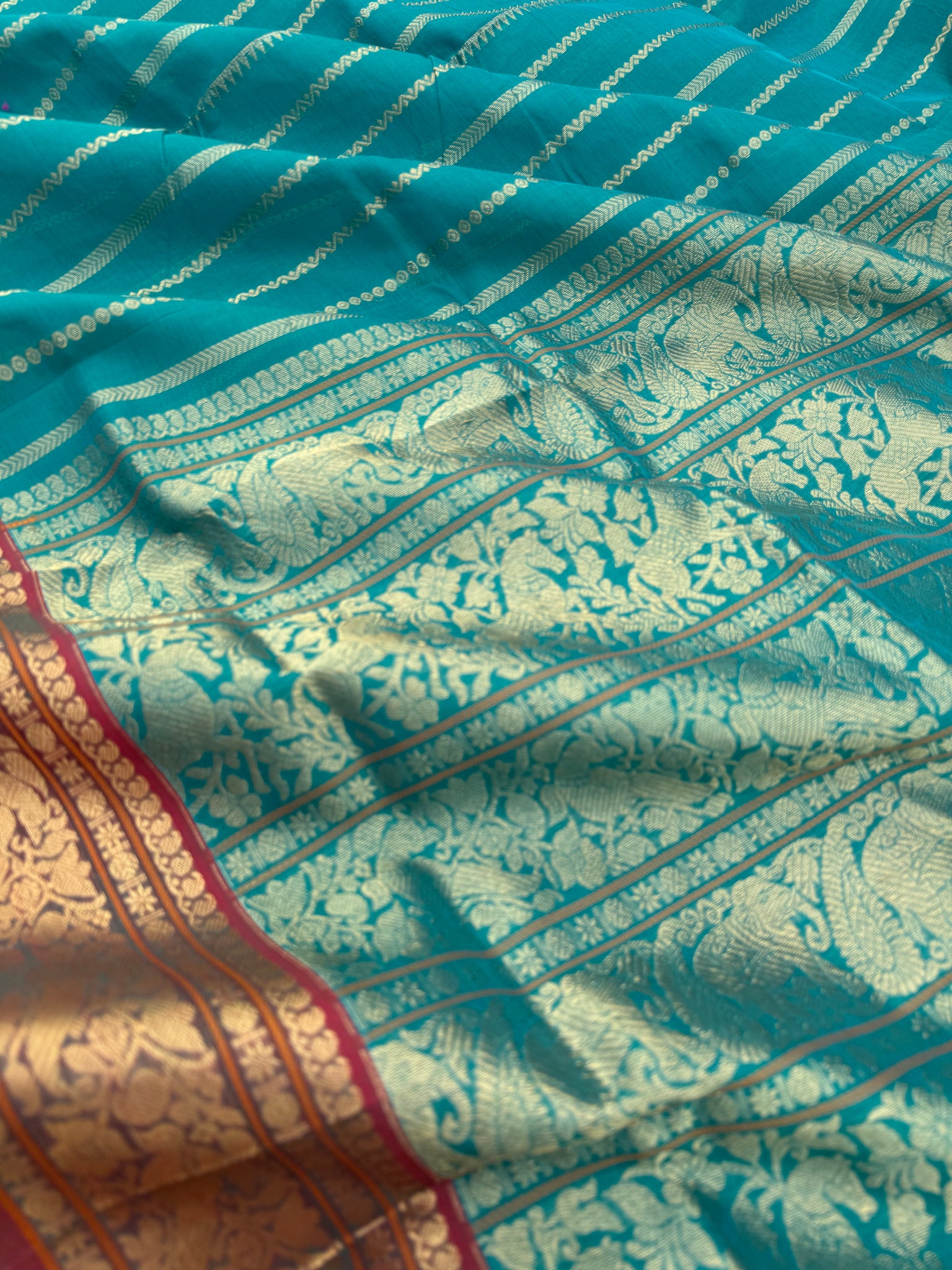 Zari Kissed Silk Cotton - teal vertical veldhari with parrots woven motifs
