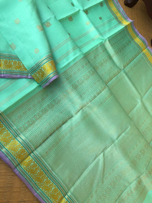 Pastel Ragas on Kanchivaram -soo beautiful soo elegant pastel pista ice cream tone body with mustard silk thread woven borders with gold zari woven intricate pallu