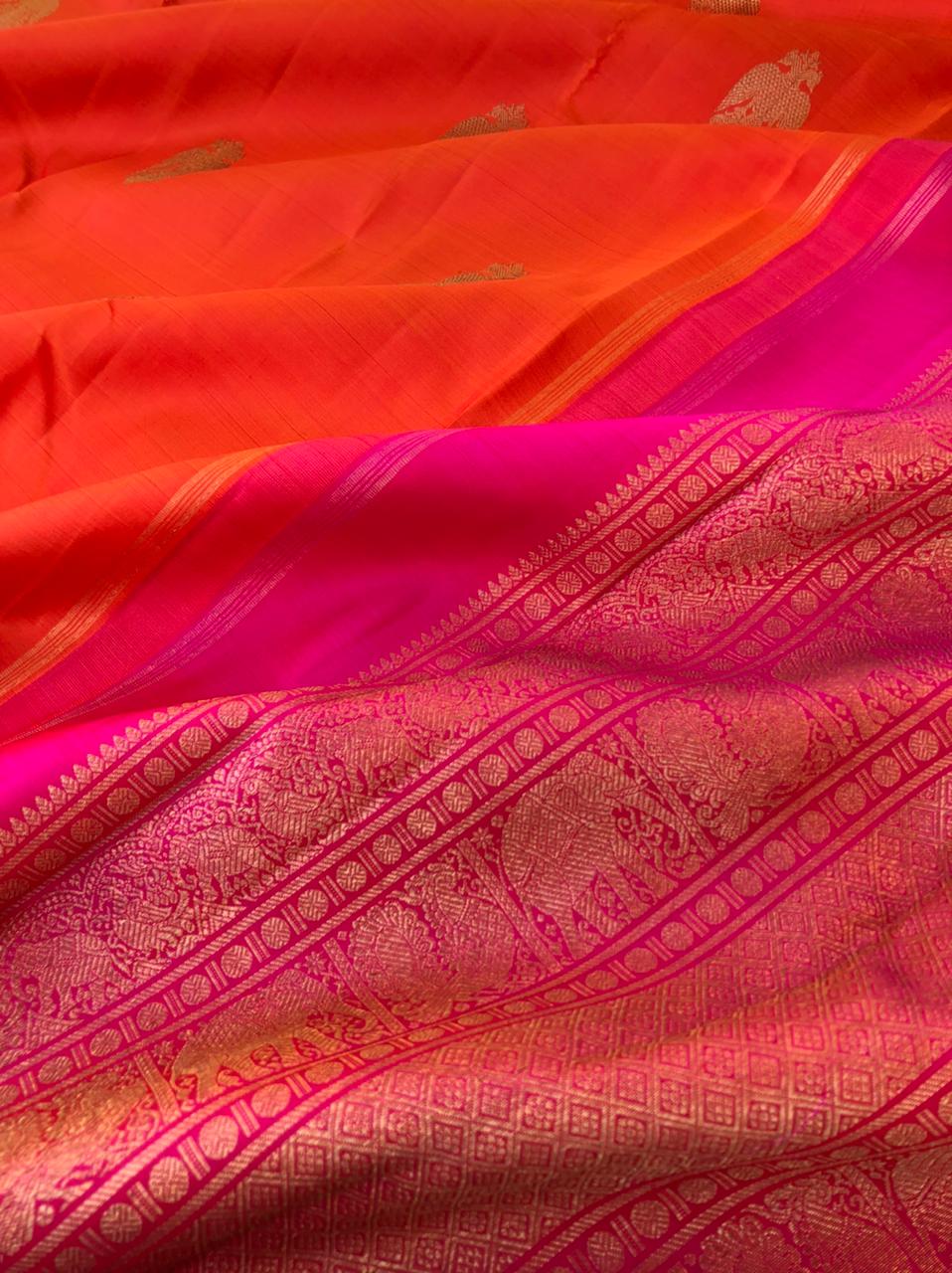 Mohaa - Beautiful Borderless Kanchivarams - rusty orange and pink Irruthalaipakshi woven buttas