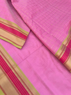 Pastels on Zari Kissed Silk Cotton - a stunning pastel baby pink with muthukattam and buttas woven together