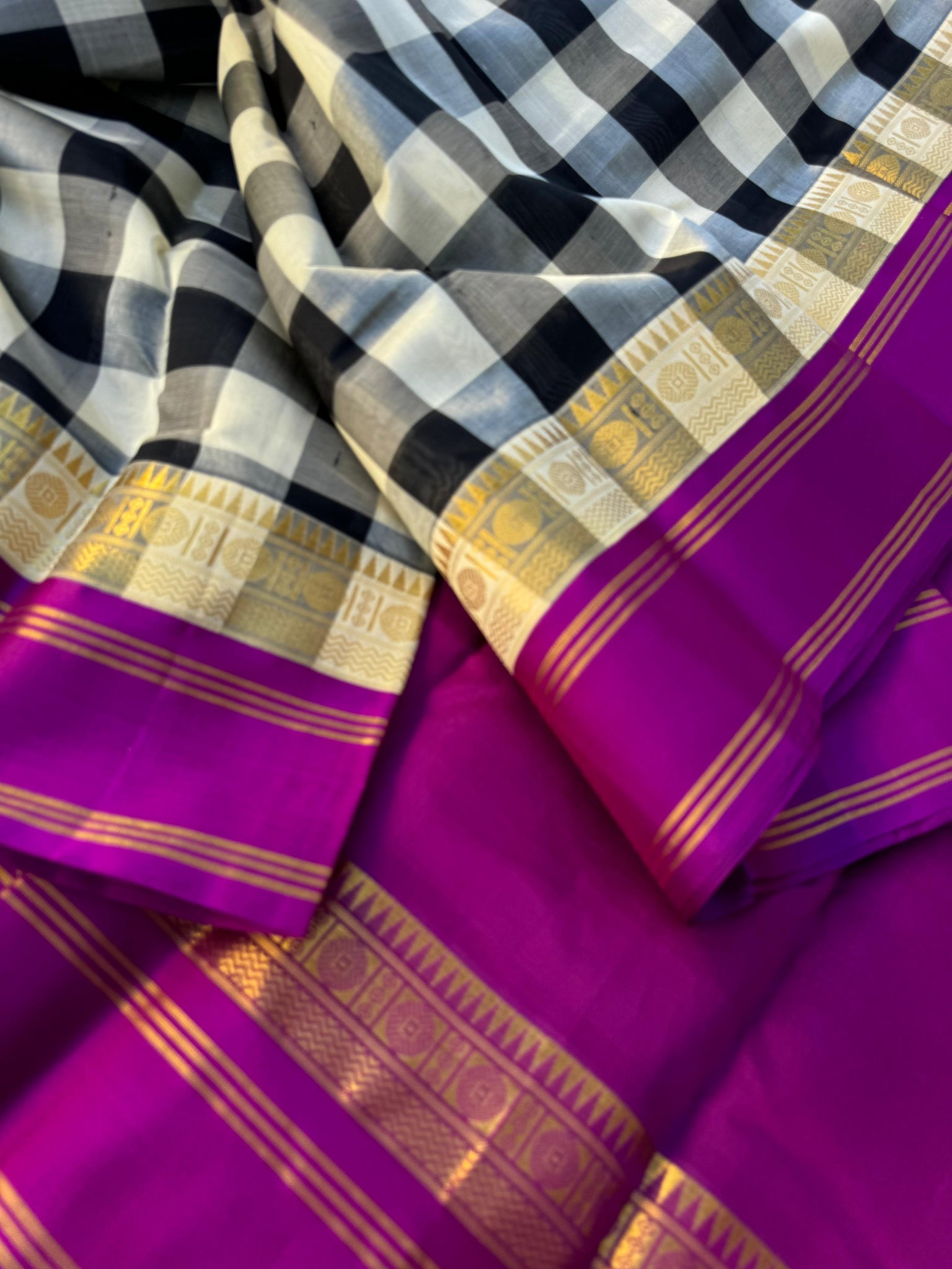 Korvai Silk Cotton - the best selling black and white high court chex with deep purple borders and pallu