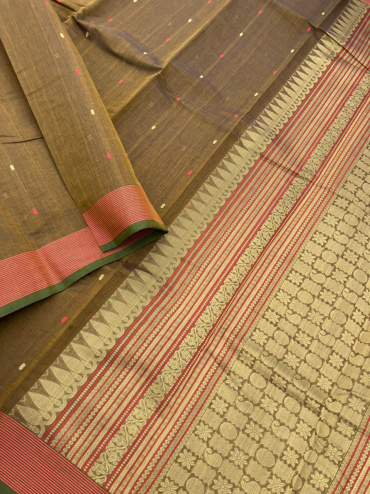 Mangalavastaram - a unique bronze tone with tiny woven buttas