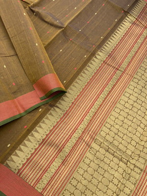 Mangalavastaram - a unique bronze tone with tiny woven buttas