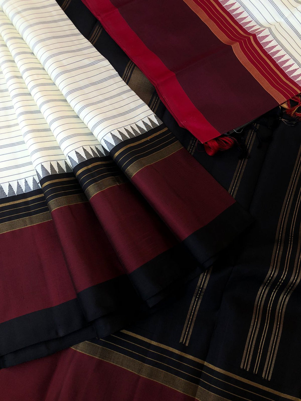Connected by Korvai on Kanchivaram -classy smart off-white with black and wine ganga jammuna korvai woven boarders