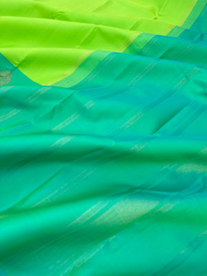 Diwali Edits - Kanchivaram For All Occasions - shocking green and dual tone aqua with one side woven broad with irruthalai pakshai woven buttas