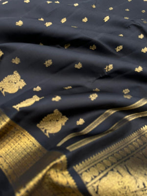 Vintage Ragas on Kanchivaram - a rarest gem of this collection, a full black and gold with old charm bettu buttas woven borders