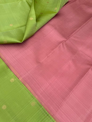 Mohaa - Rarest Borderless Kanchivarams - A fresh green with two part pallu one with paisley buttas other with pale pink grand weave